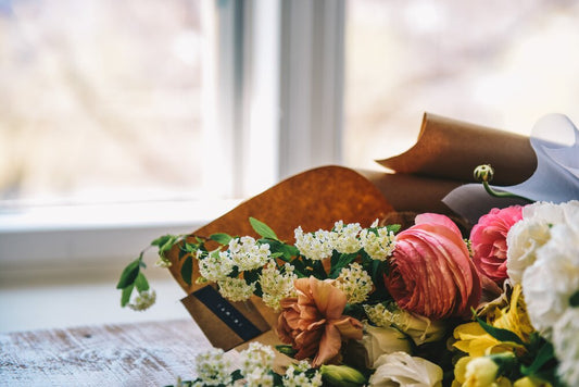 Close-up of flowers, symbolizing remembrance and the costs often associated with cremation services.