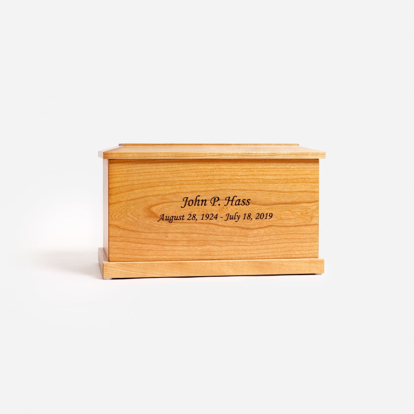 Front view of traditional handcrafted cherry wood cremation urn – adult-size memorial urn with smooth lacquer finish