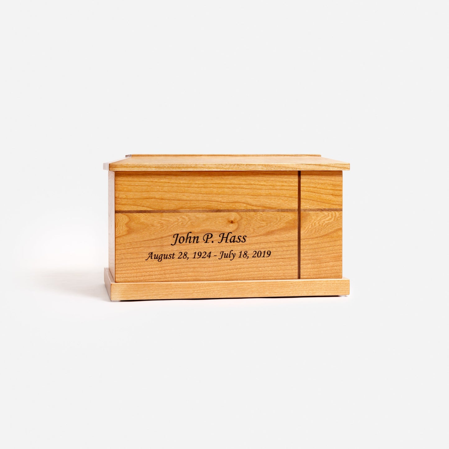 Front view of traditional cherry cremation urn with inlaid cross – handcrafted memorial urn for ashes