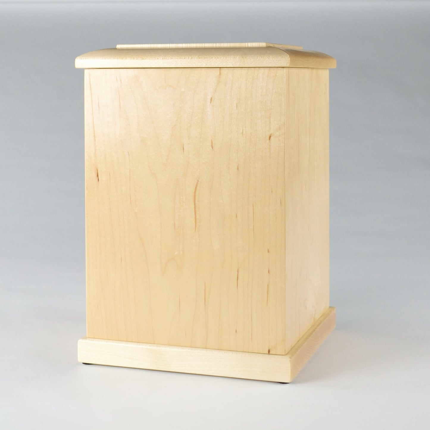 Solid maple cremation urn for ashes – side angle showing lacquer finish