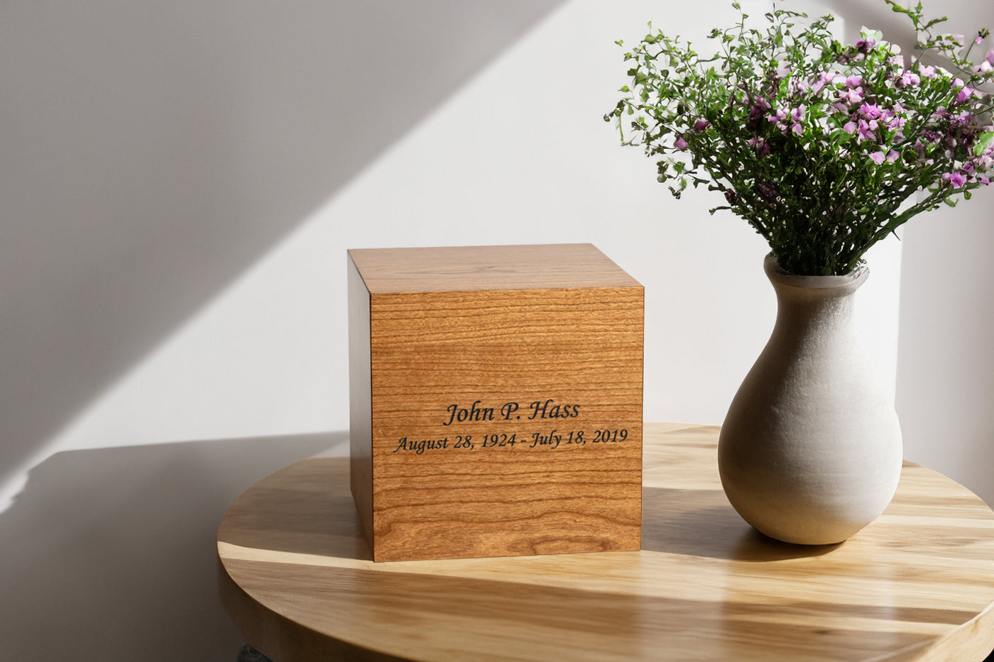 Cherry cremation urn displayed in home setting – handcrafted tribute for a loved one