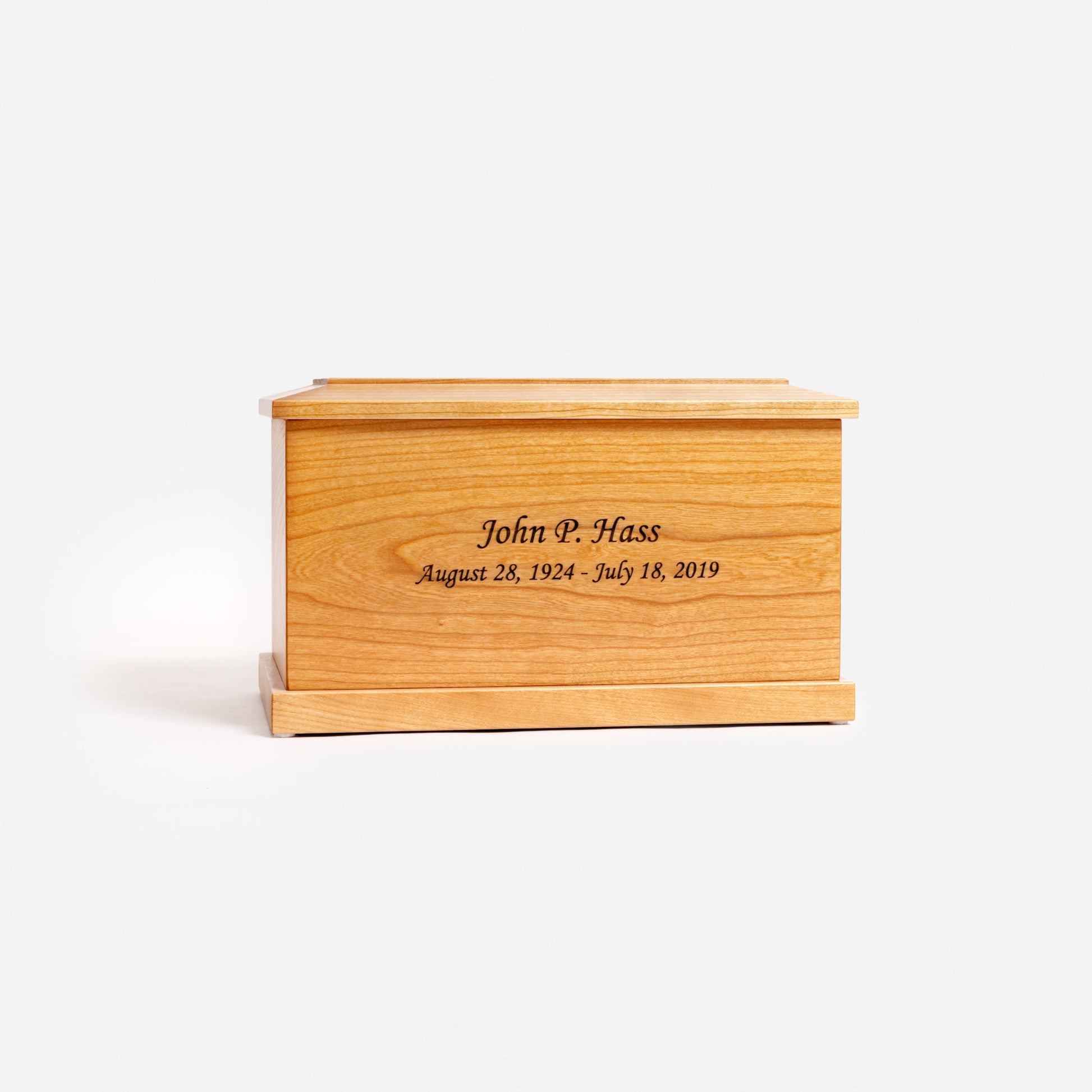 Front view of traditional handcrafted cherry wood cremation urn – adult-size memorial urn with smooth lacquer finish