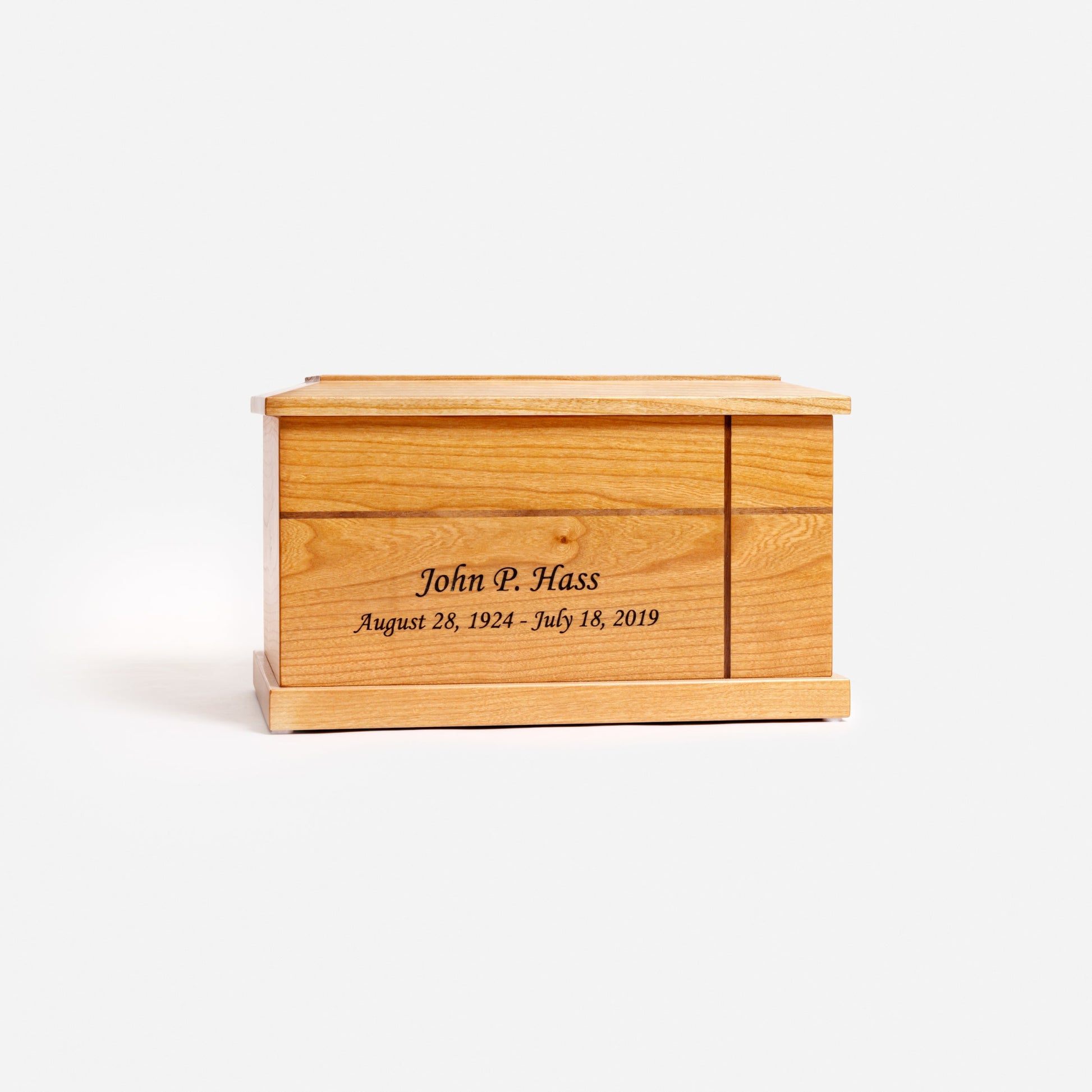 Front view of traditional cherry cremation urn with inlaid cross – handcrafted memorial urn for ashes