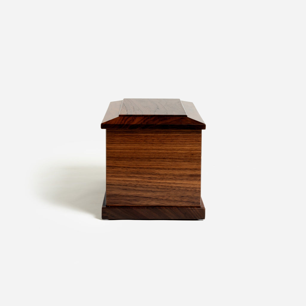 Side view of rectangular walnut cremation urn – built in Milwaukee with care