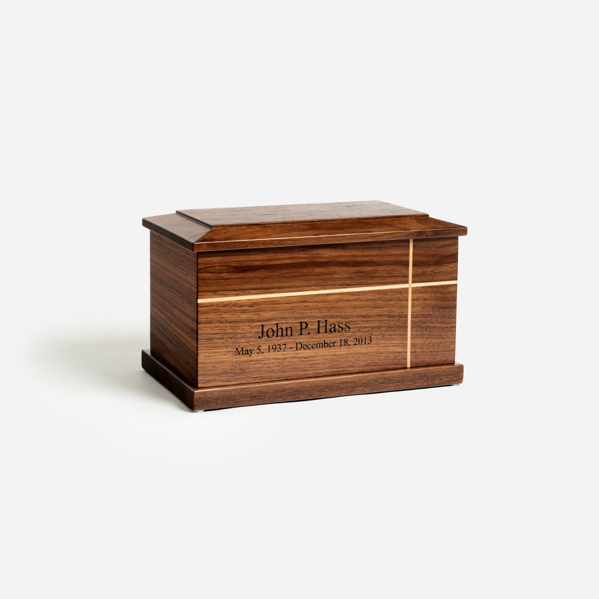 Angled front view of walnut wood urn showing craftsmanship and smooth lacquer finish