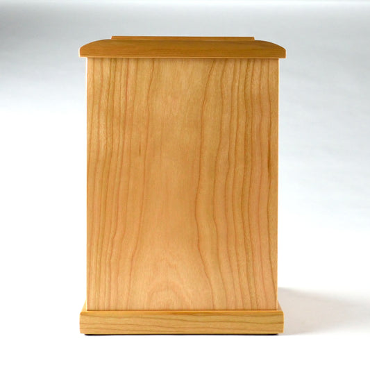 Front view of upright handcrafted cherry cremation urn – adult-size memorial urn with lacquer finish