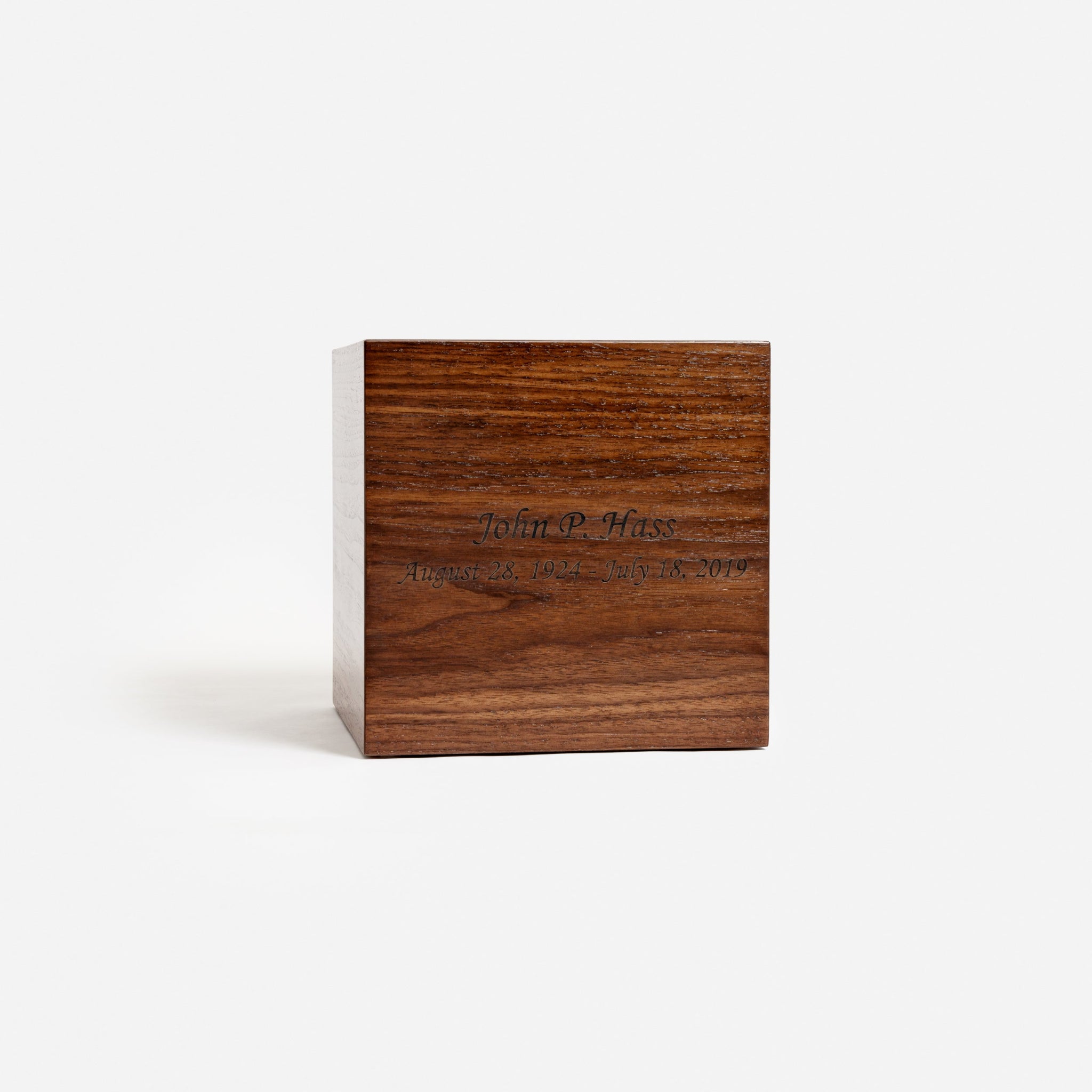 Front view of handcrafted walnut veneer cremation urn with bronze stain – adult urn for ashes